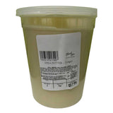 Large plastic tub of natural shea butter with a clear lid and a white product label displaying a barcode, the text “Shea Butter (Large),” handling instructions, weight, and a price of $17.99.