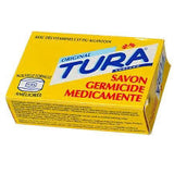 Tura Germicidal Medicated Soap 65g bar in white and blue packaging, designed to help treat skin conditions and kill germs.
