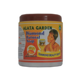 Diamond Garden Natural Alata Soap 600g in a clear package, showing brown traditional African black soap with a green and yellow product label featuring natural elements.